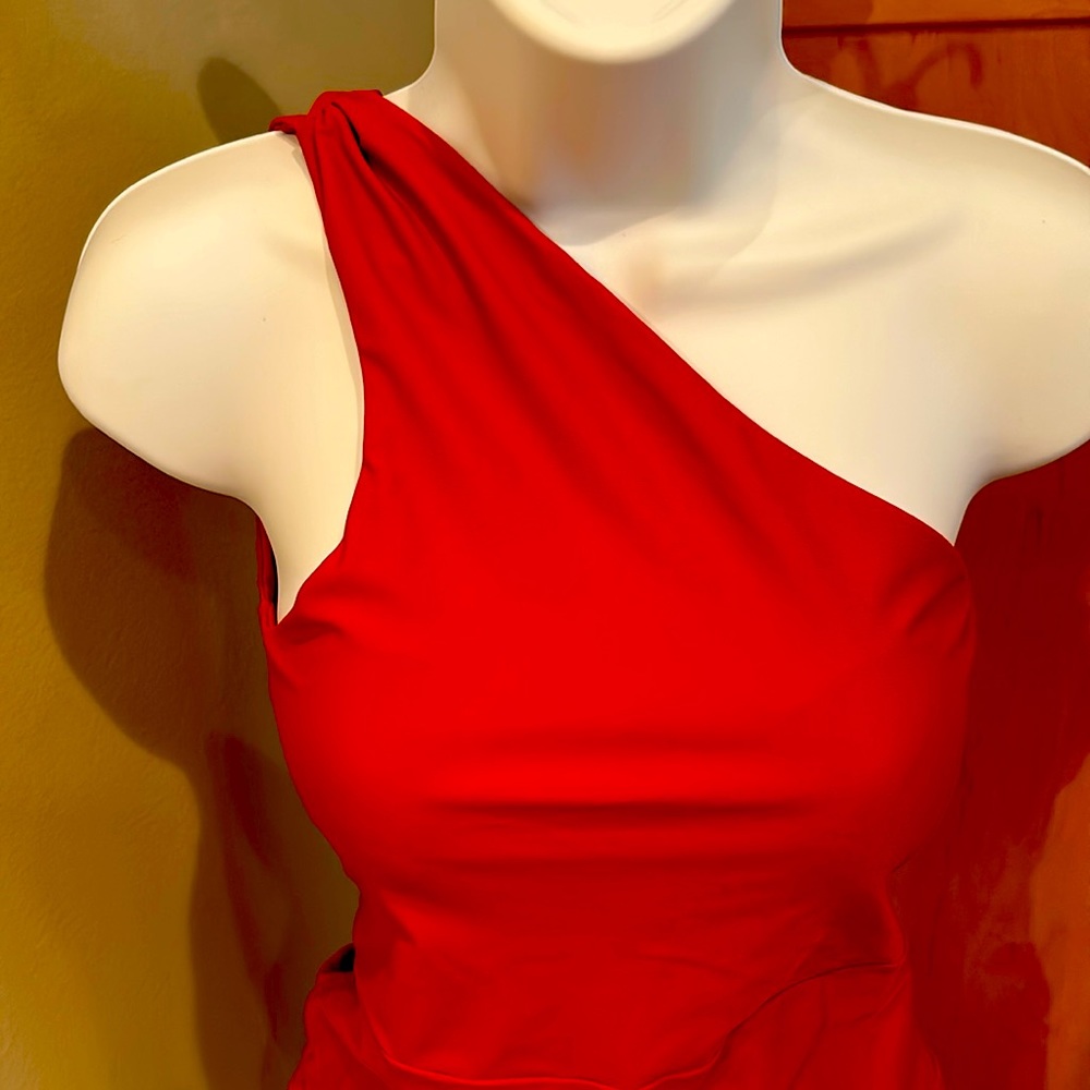 Woman’s swimsuit with matching coverup wrap skirt.